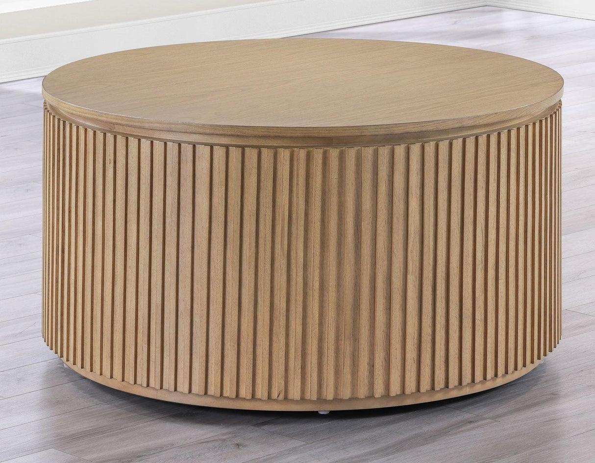 Colvin Toffee Finish 36″ Round Castered Coffee Table by Steve Silver at Eve Furniture