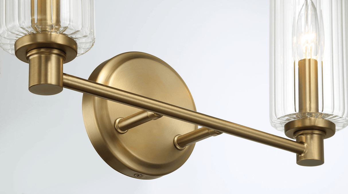 Regal Double Light Vanity With Clear Ribbed Glass - Satin Brass by Ashcroft Imports at Eve Furniture