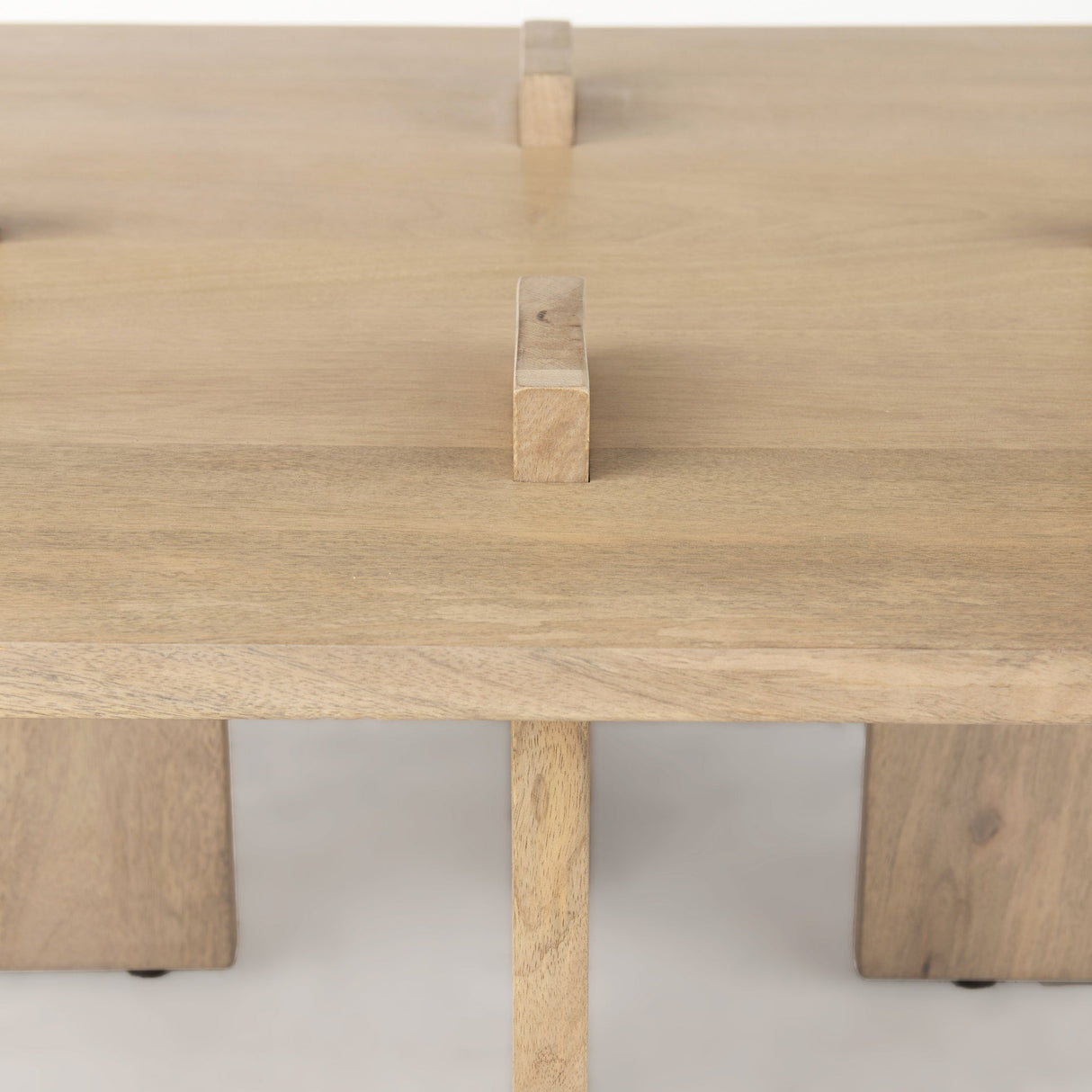 Aida 56 x 34 Rectangular Light Brown Wood Coffee Table by Mercana at Eve Furniture