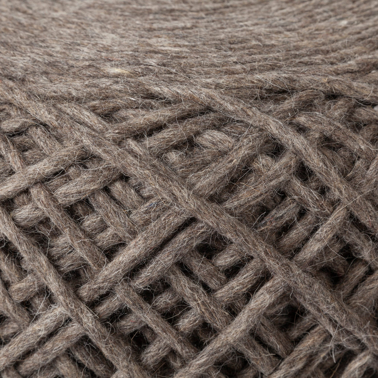 Allium Dark Brown Handwoven Wool Cylindrical Pouf by Mercana at Eve Furniture