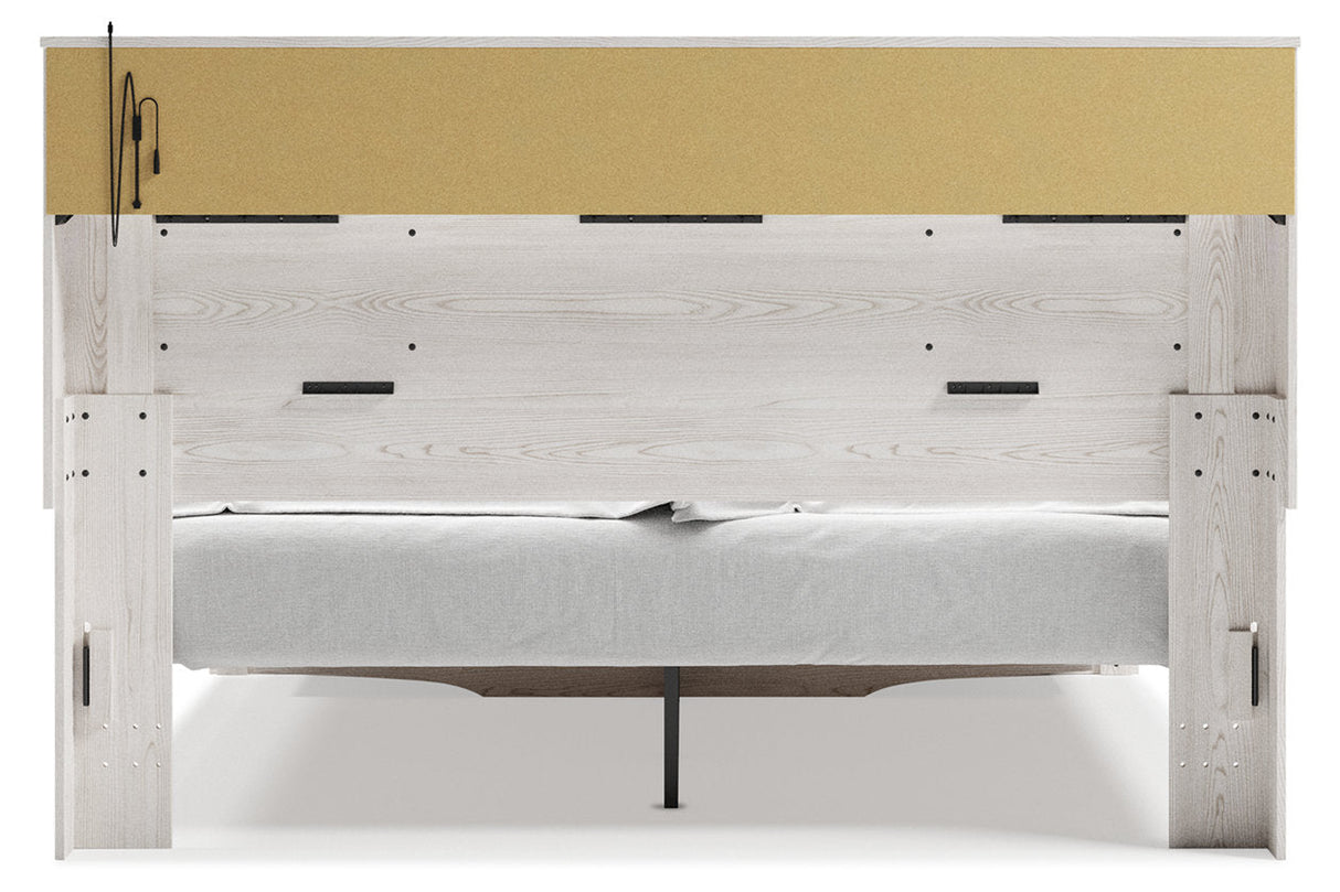 Altyra White King Upholstered LED Bookcase Storage Panel Bed by Ashley at Eve Furniture