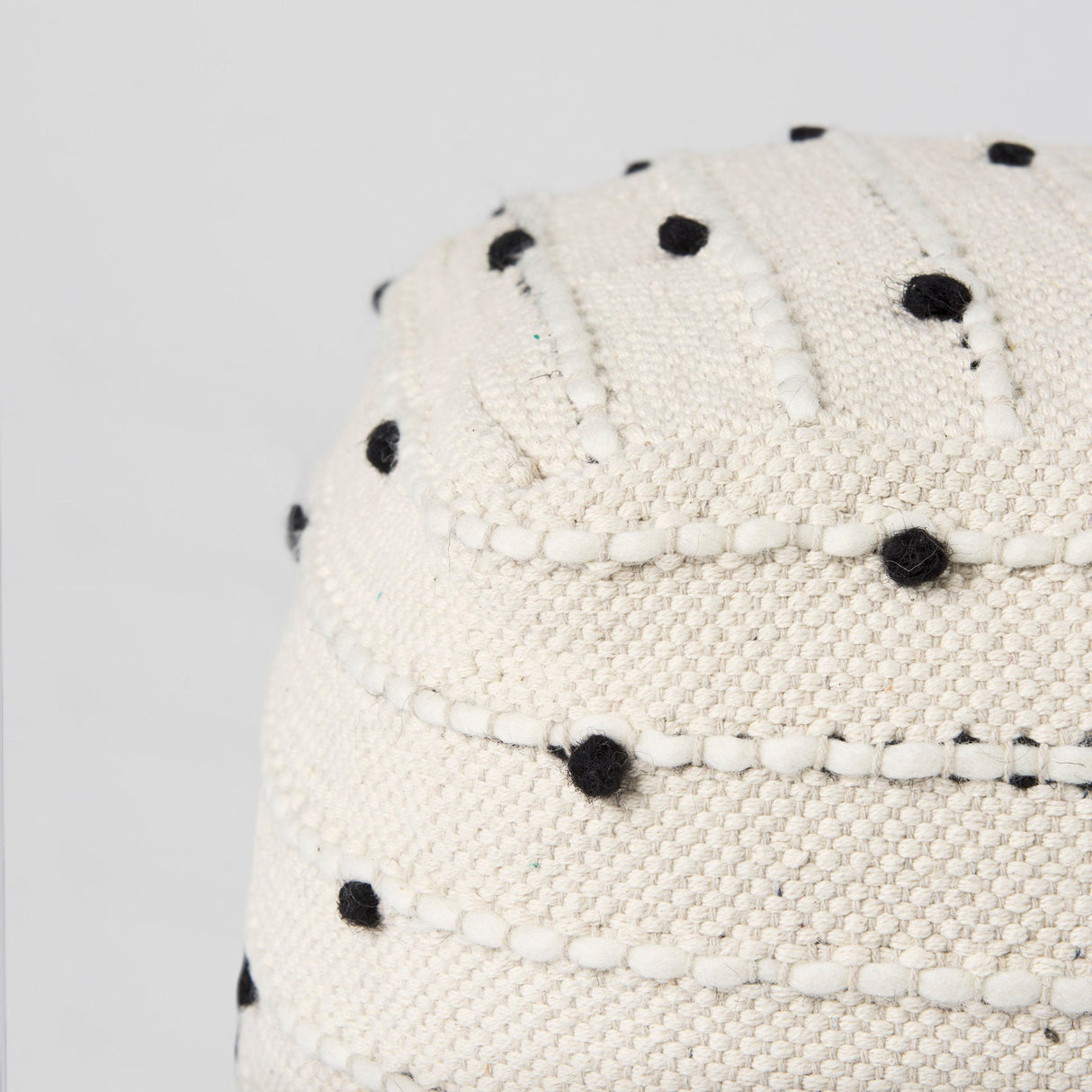 Amaira 16.0L x 16.0W x 16.0H Cream/Black/White patterned Wool and Cotton Pouf by Mercana at Eve Furniture