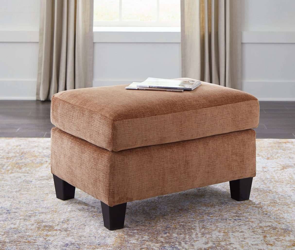 Amity Bay Clay Ottoman by Ashley at Eve Furniture