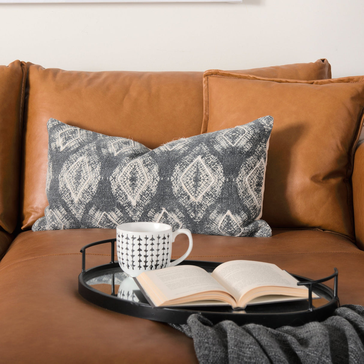 Ansel Black Metal Mirrored Bottom Oval Serving Tray by Mercana at Eve Furniture