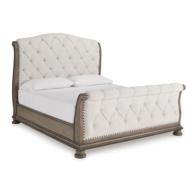 Ardenfield Light Brown Queen Upholstered Sleigh Bed by Ashley at Eve Furniture