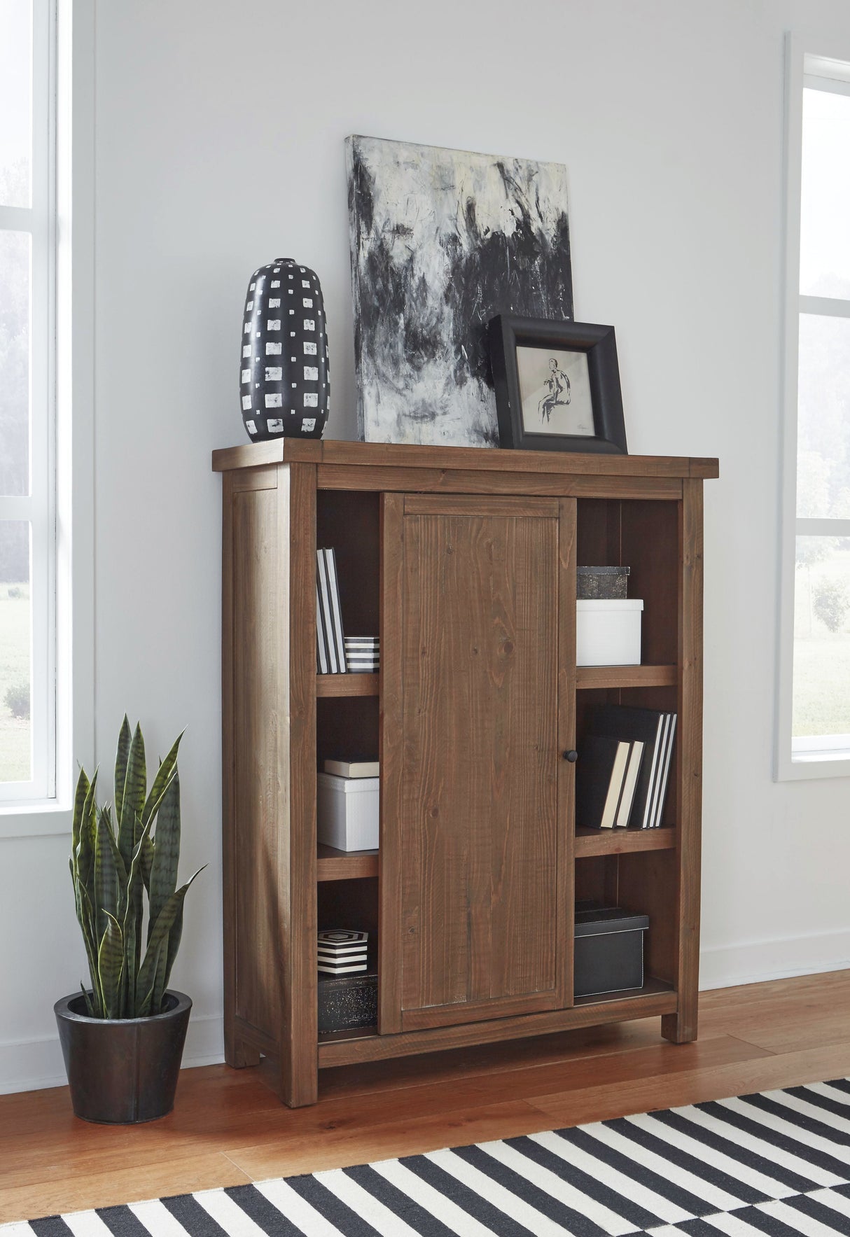 Autumn Sliding Door Bookcase in Flint Oak by Modus Furniture at Eve Furniture