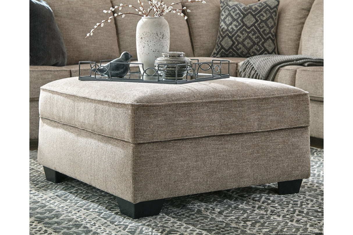 Bovarian Stone Ottoman by Ashley at Eve Furniture