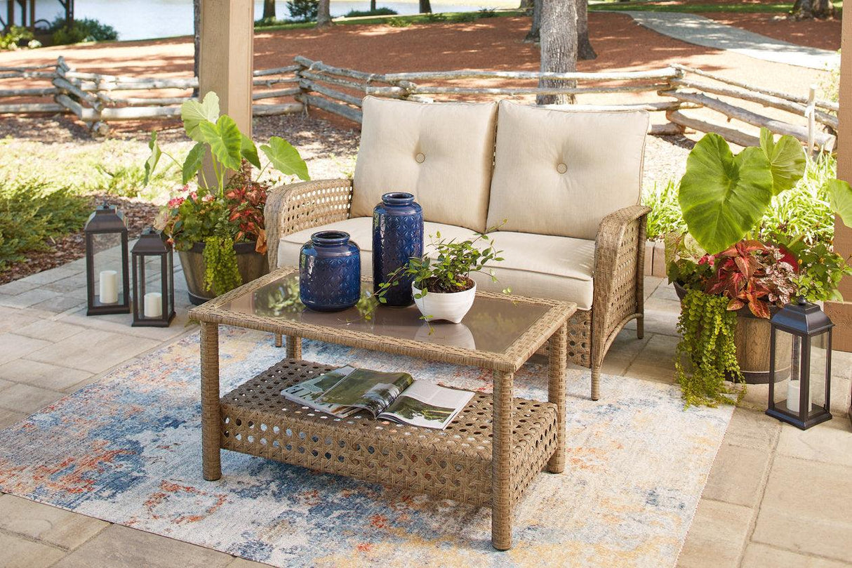 Braylee Driftwood Outdoor Loveseat with Table by Ashley at Eve Furniture
