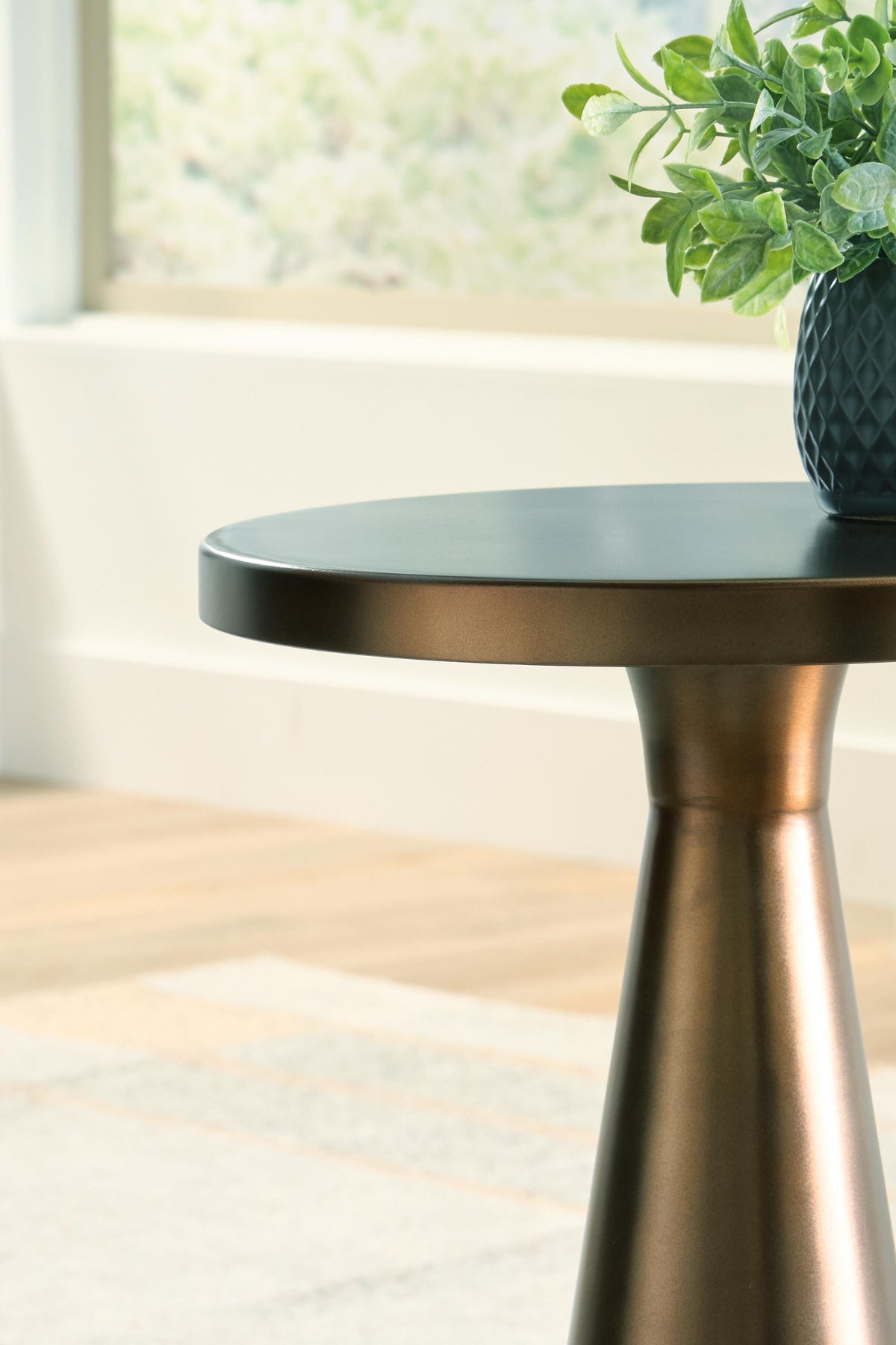 Budington Light Bronze Finish Accent Table by Ashley at Eve Furniture