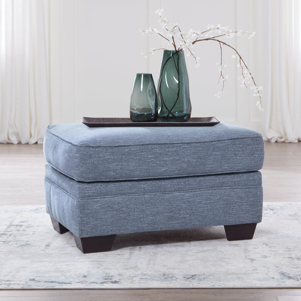 Carissa Manor Denim Performance Fabric Ottoman by Ashley at Eve Furniture