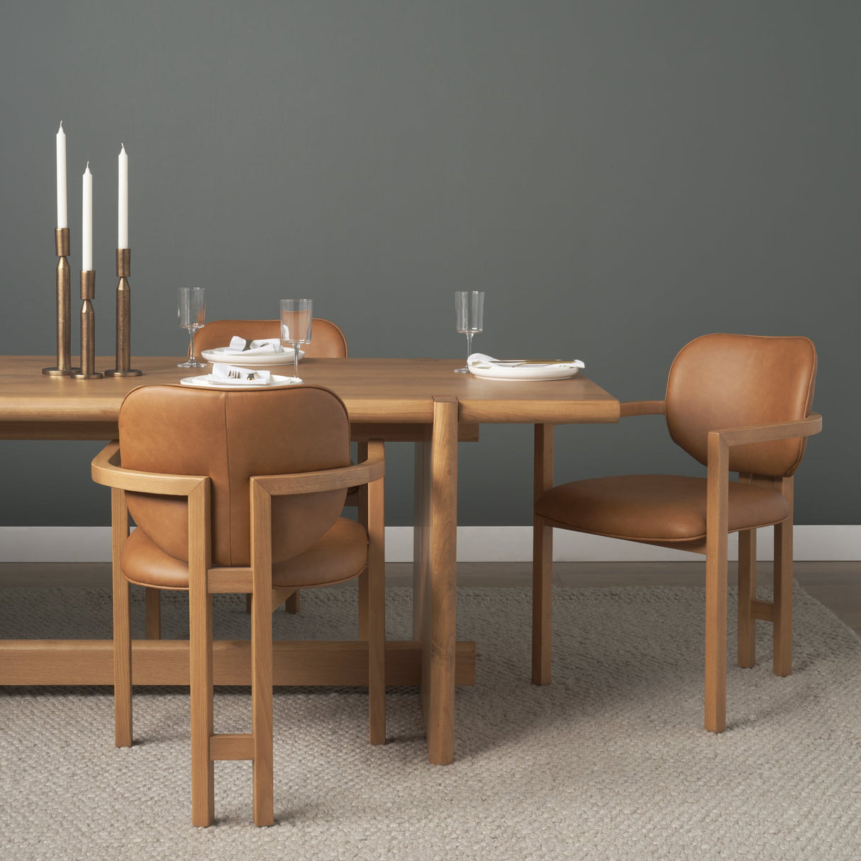 Carlisle Curved Back Tan Leather Tripod Frame Dining Armchair by Mercana at Eve Furniture