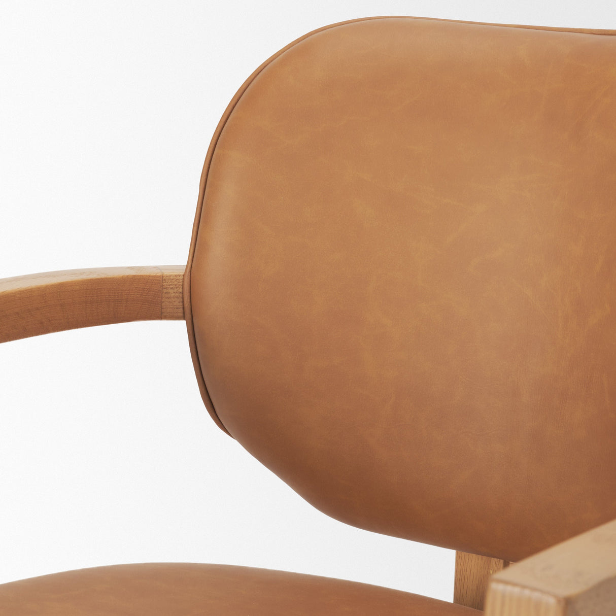 Carlisle Curved Back Tan Leather Tripod Frame Dining Armchair by Mercana at Eve Furniture