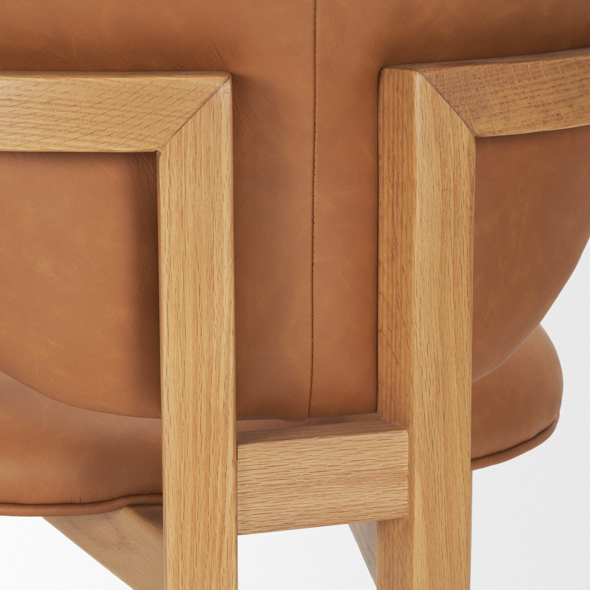 Carlisle Curved Back Tan Leather Tripod Frame Dining Armchair by Mercana at Eve Furniture
