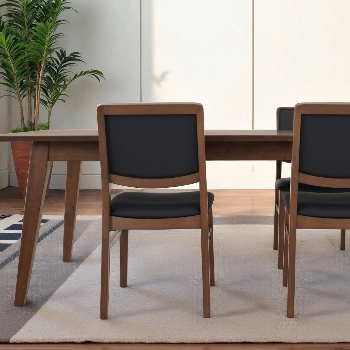 Cary Walnut Finished Solid Wood and Easy Clean Vegan Leather Upholstered Dining Chairs (Set of 2) by Ashcroft Imports at Eve Furniture