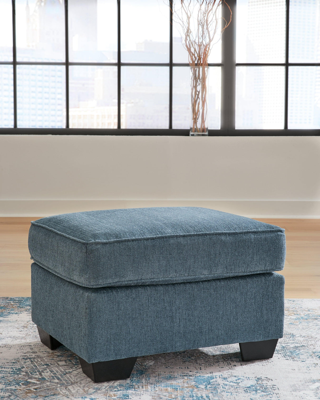 Cashton Blue Ottoman by Ashley at Eve Furniture