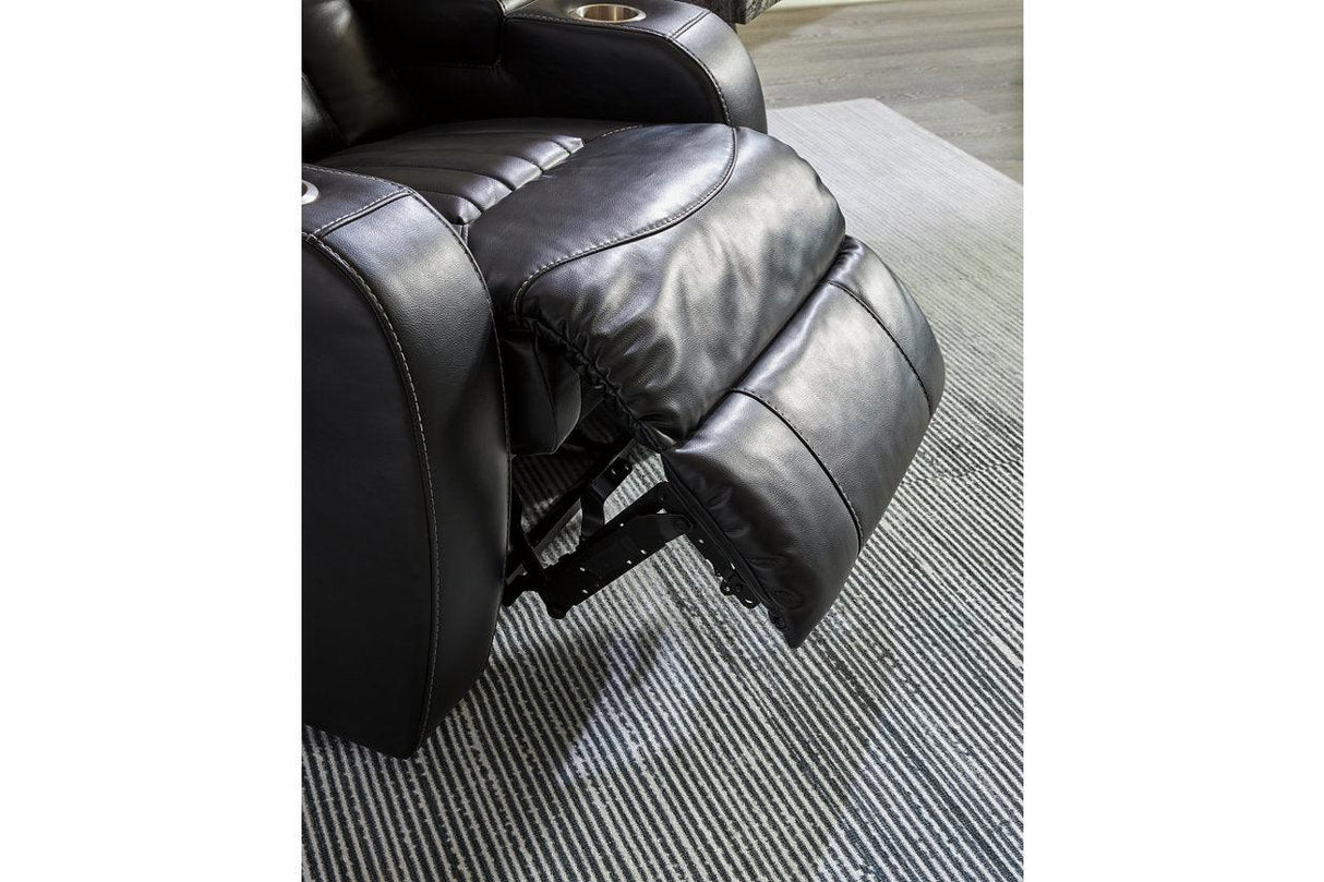 Caveman Den Midnight Dual Power Reclining Sofa and Loveseat by Ashley at Eve Furniture