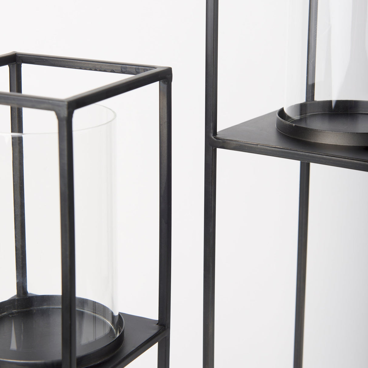 Cindy Set of 2 Matte Black Metal and Hurricane Glass Pillar Tabletop Candle Holders by Mercana at Eve Furniture