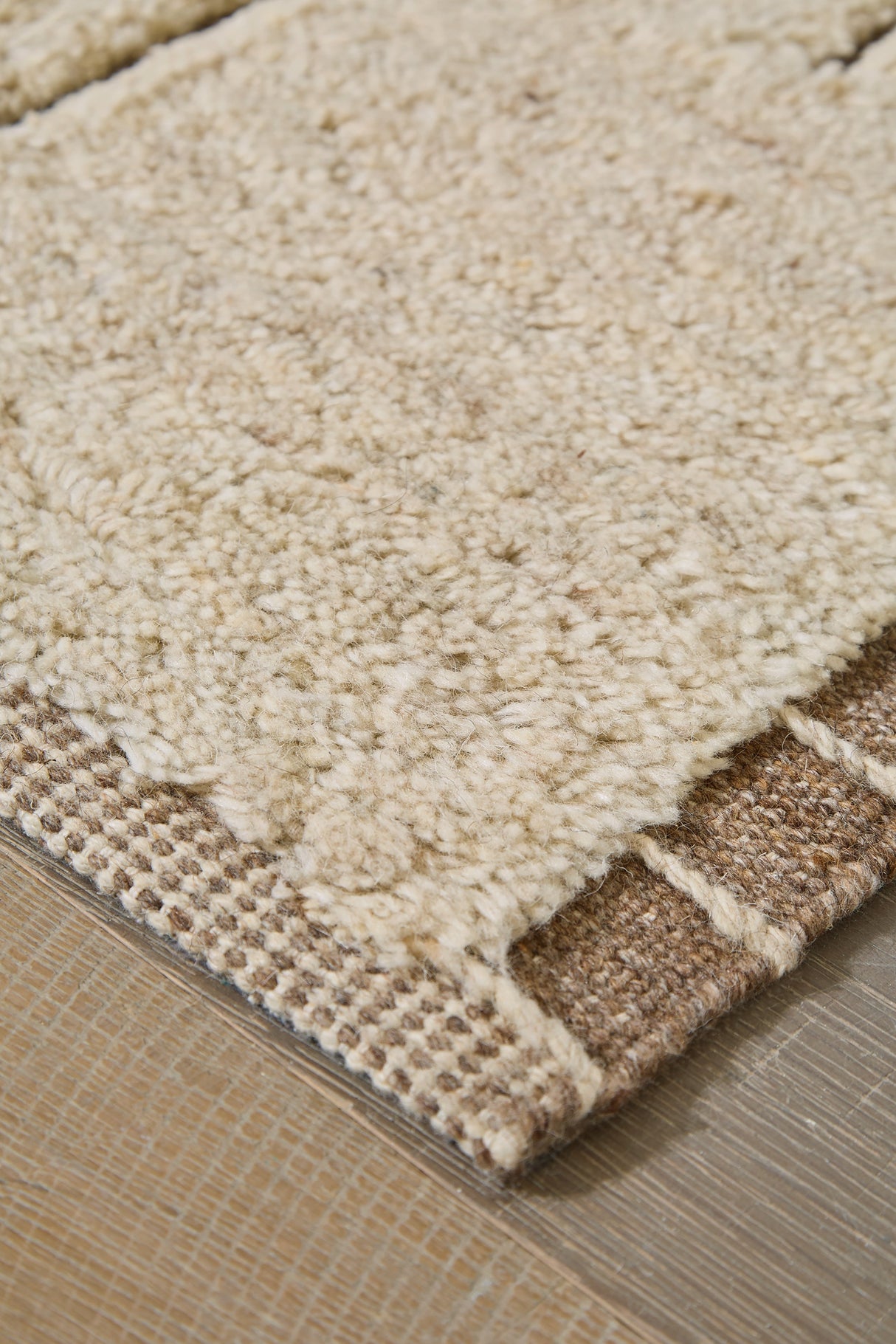 Clayman Beige/Brown Extra Large Rug by Ashley at Eve Furniture
