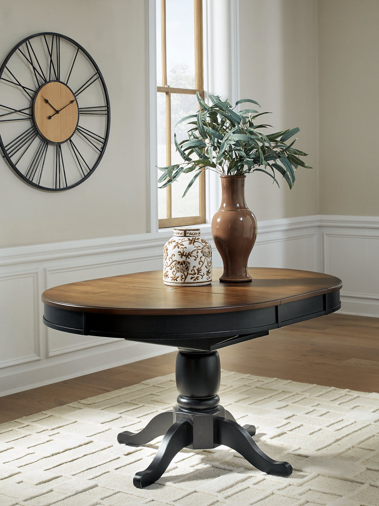 Clorazi Black/Brown Dining Butterfly Extension Table by ASHLEY FURNITURE at Eve Furniture