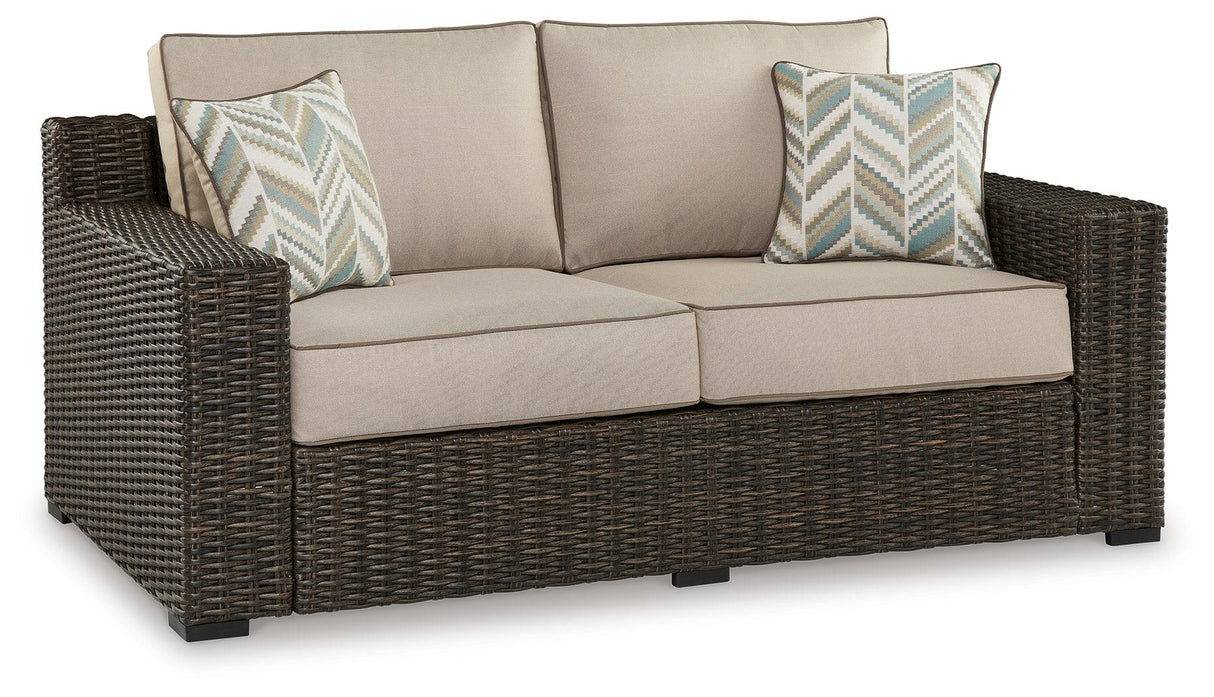Coastline Bay Brown Outdoor Loveseat with Cushion by Ashley at Eve Furniture