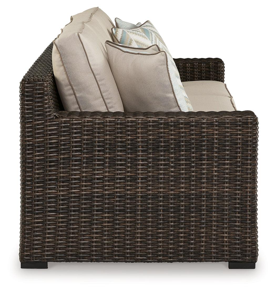 Coastline Bay Brown Outdoor Sofa with Cushion by Ashley at Eve Furniture