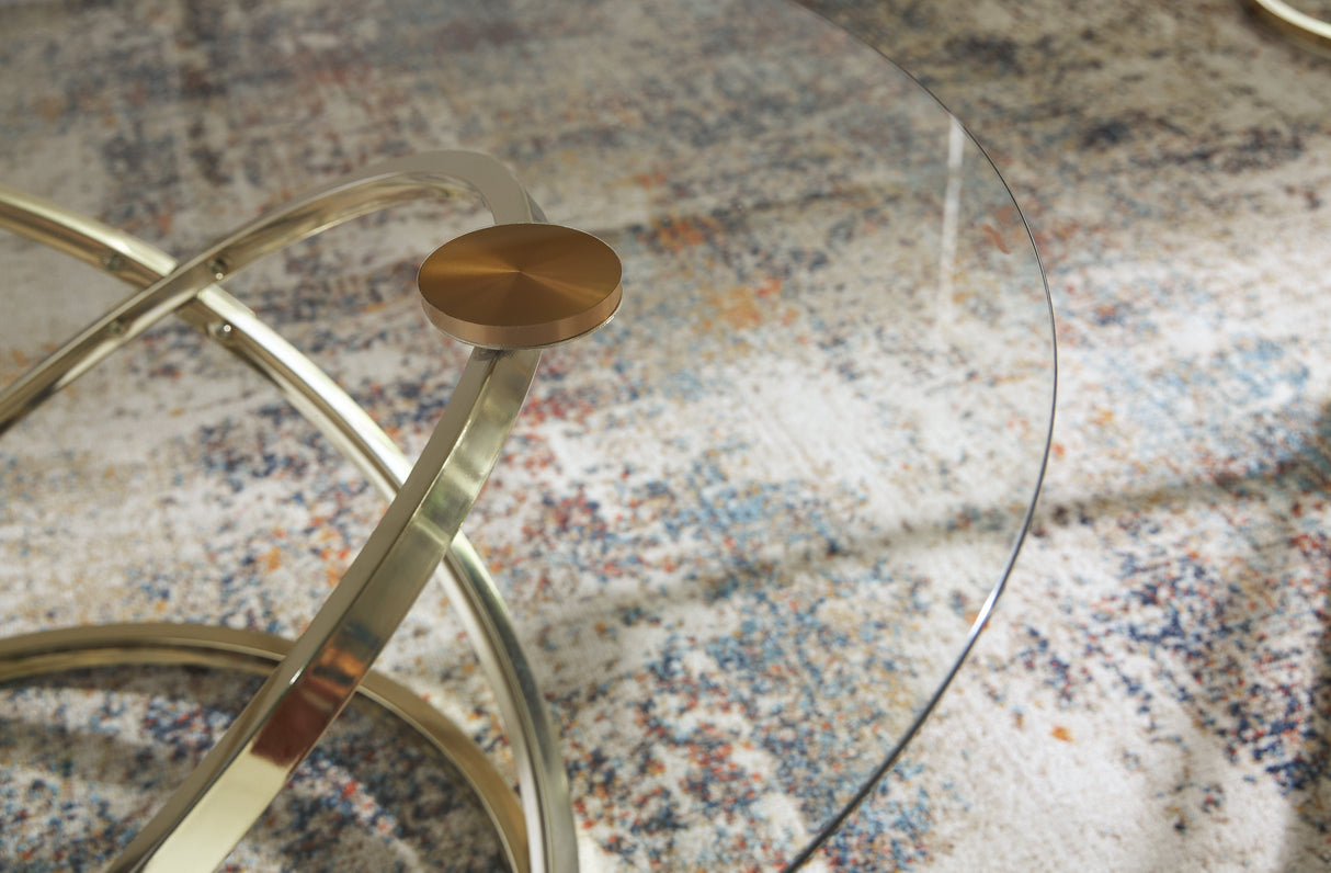 Crimonti Champagne Table by Ashley at Eve Furniture