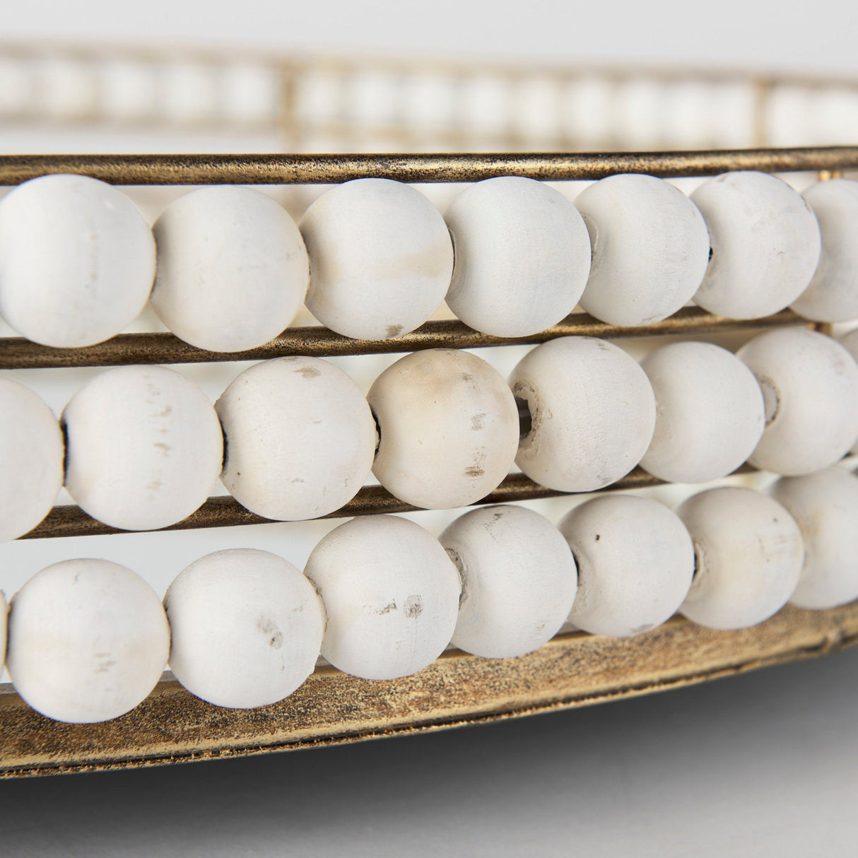 Decatur I 21L x 21W White Wooden Bead Mirrored Bottom Round Tray by Mercana at Eve Furniture