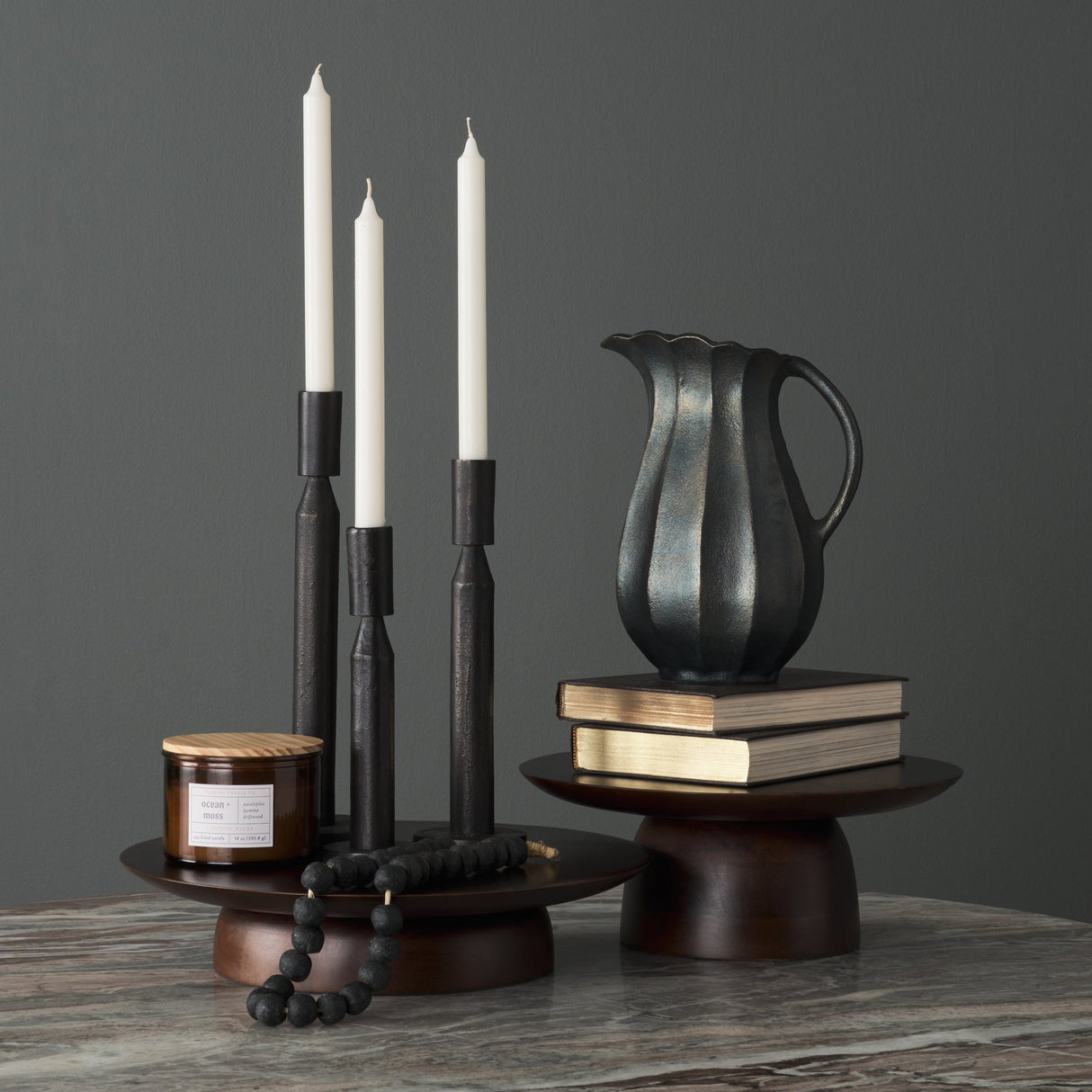 Declan Textured Matte Black Cast Metal Taper Candle Holder by Mercana at Eve Furniture