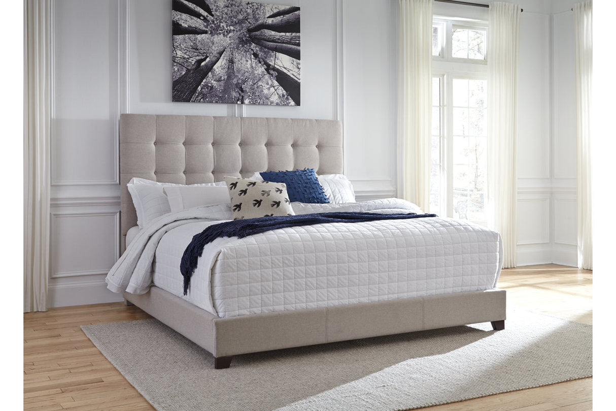Dolante Beige King Upholstered Bed by Ashley at Eve Furniture