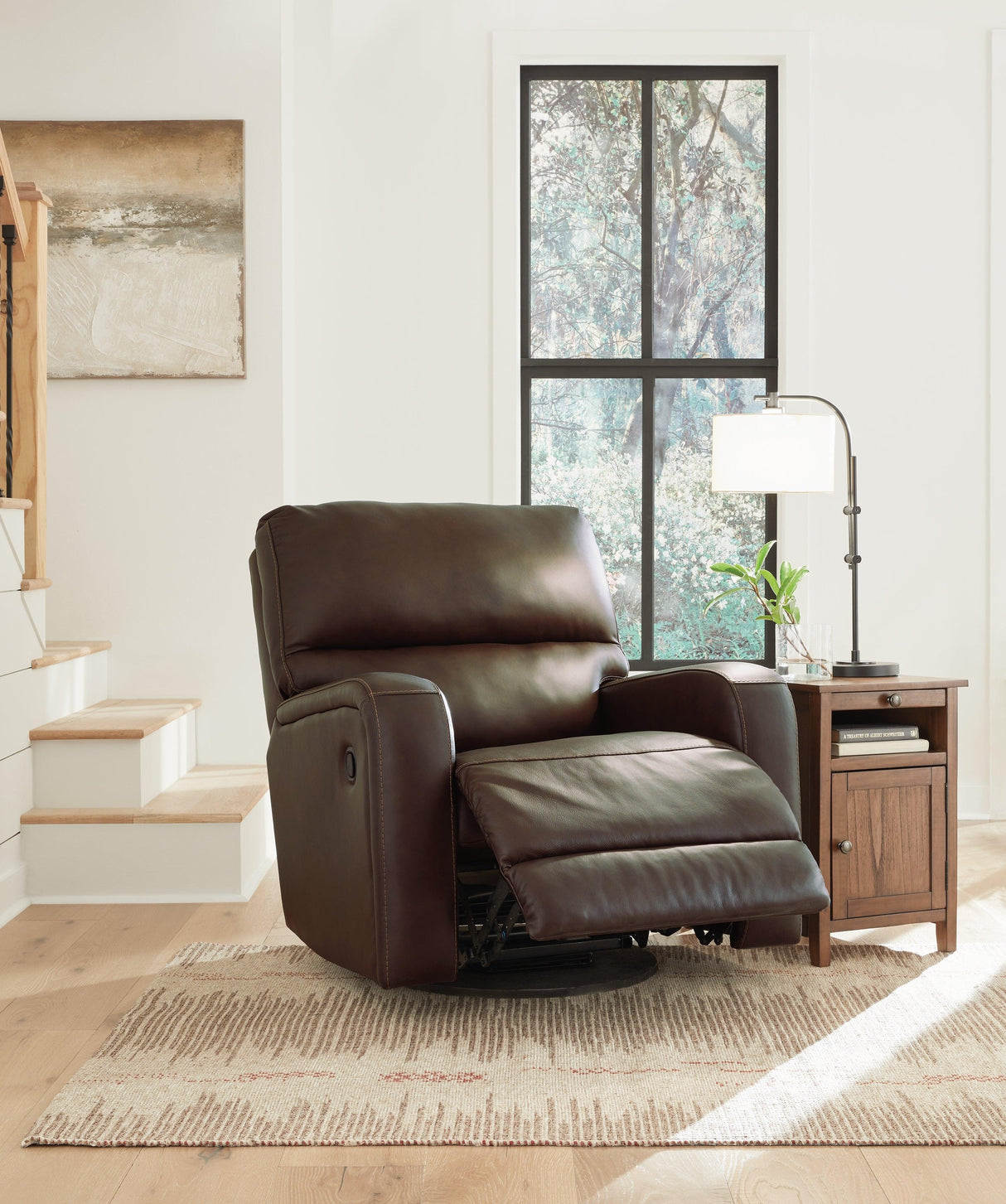 Emberla Coffee Swivel Glider Recliner by Ashley at Eve Furniture