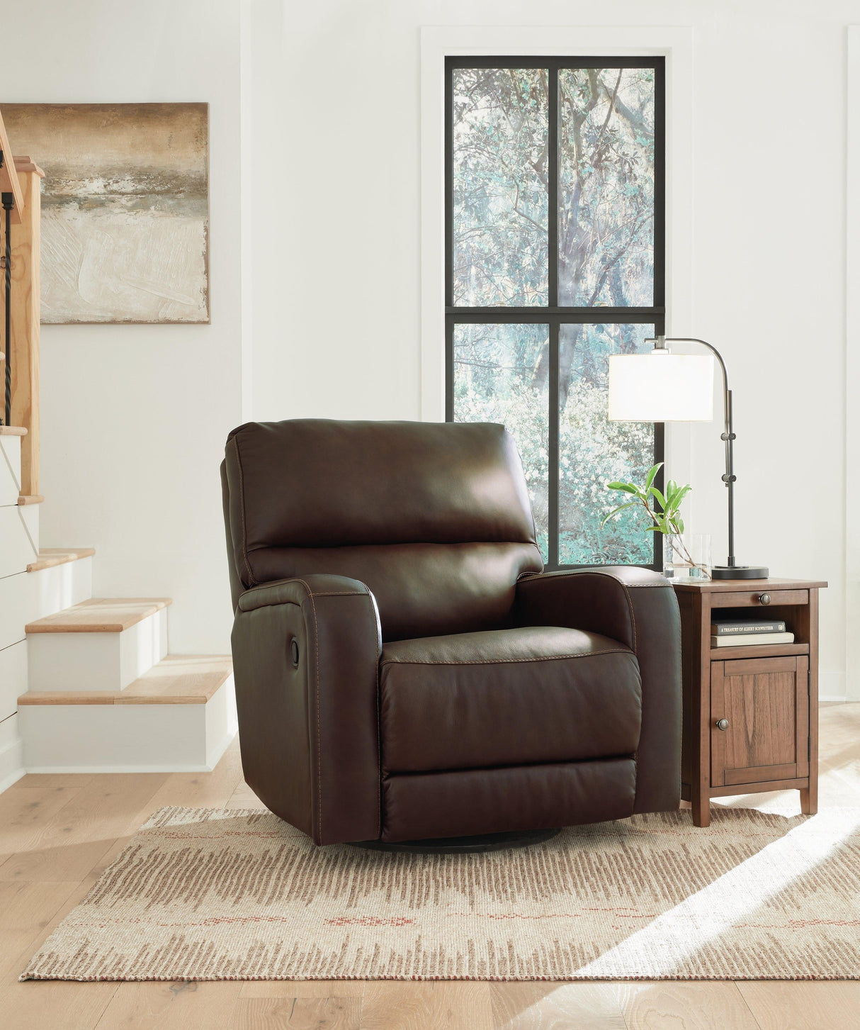 Emberla Coffee Swivel Glider Recliner by Ashley at Eve Furniture
