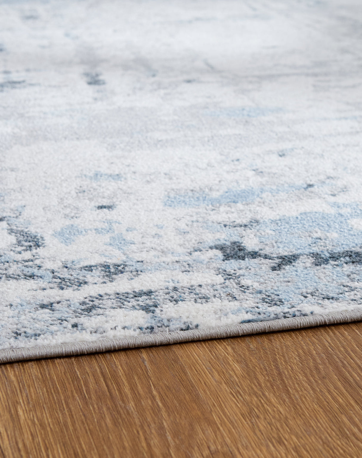 Emertonly Blue/White/Gray Medium Rug by ASHLEY FURNITURE at Eve Furniture