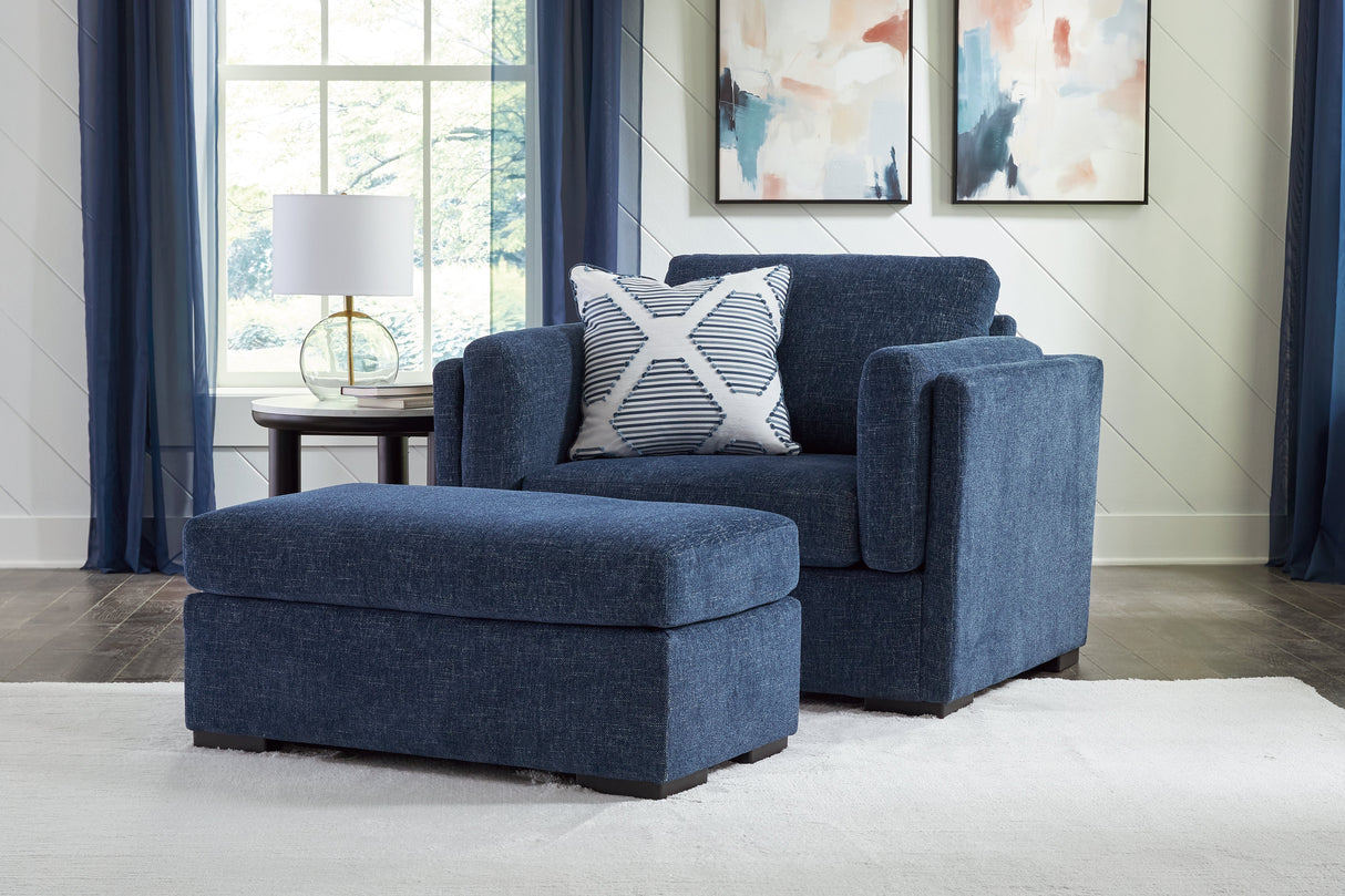 Evansley Chair and Ottoman in Navy by Ashley at Eve Furniture
