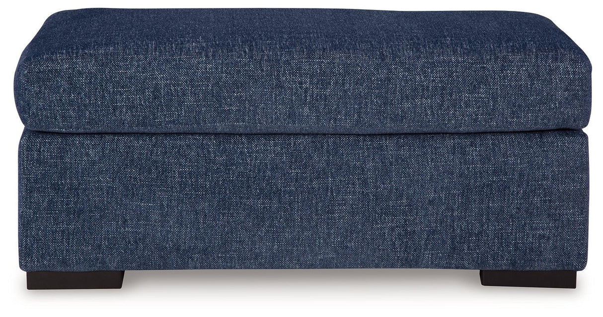 Evansley Navy Ottoman by Ashley at Eve Furniture