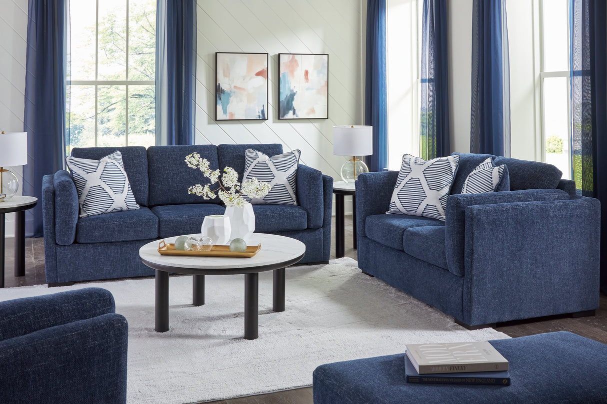 Evansley Sofa, Loveseat, Chair and Ottoman in Navy by Ashley at Eve Furniture