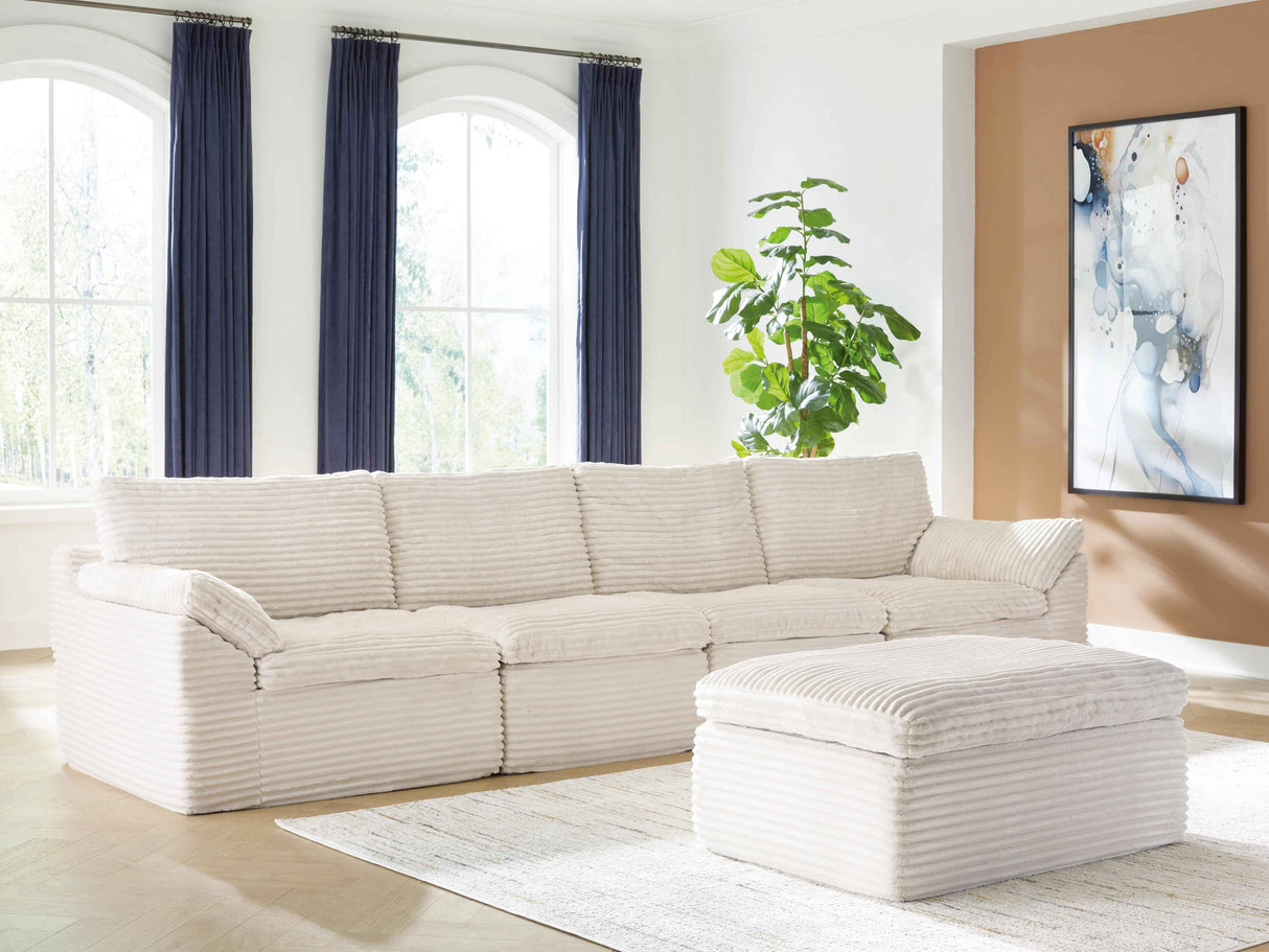 Fannin Ivory 4-Piece Sectional with Ottoman by Ashley at Eve Furniture