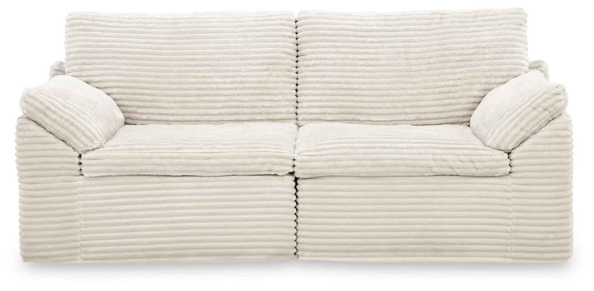 Fannin Ivory Loveseat by Ashley at Eve Furniture