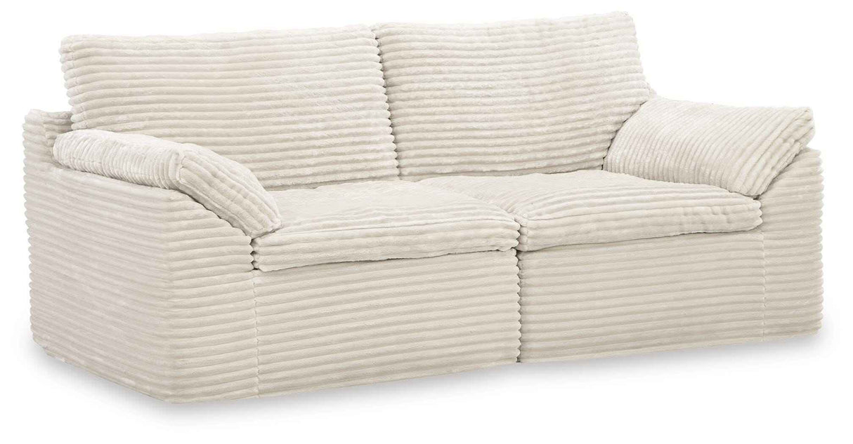 Fannin Ivory Loveseat by Ashley at Eve Furniture