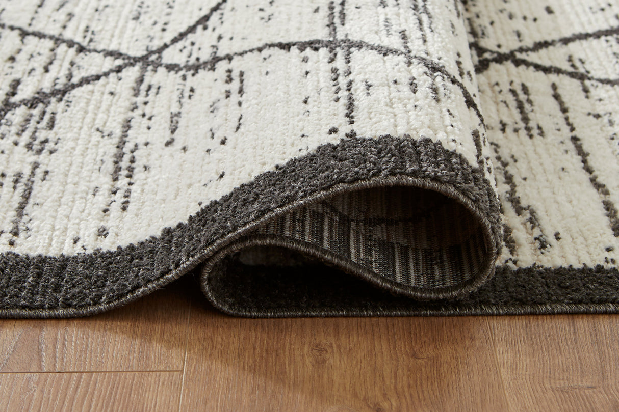 Fenriston Cream/Black Large Rug by Ashley at Eve Furniture
