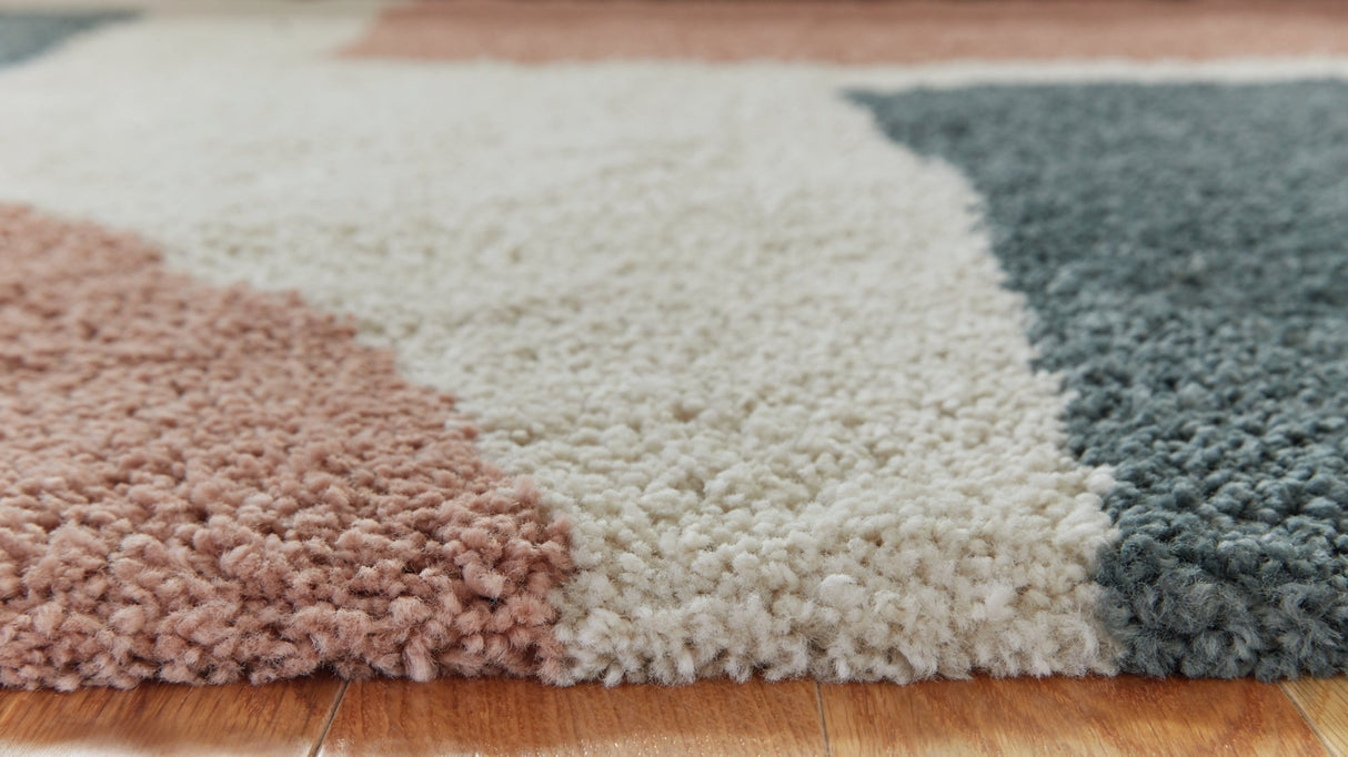 Flynnwick Cream/Pink/Gray Medium Rug by Ashley at Eve Furniture