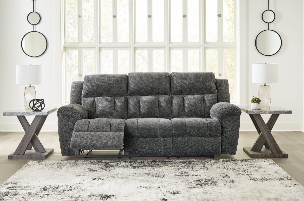 Frohn Graphite Manual Reclining Sofa by Ashley at Eve Furniture