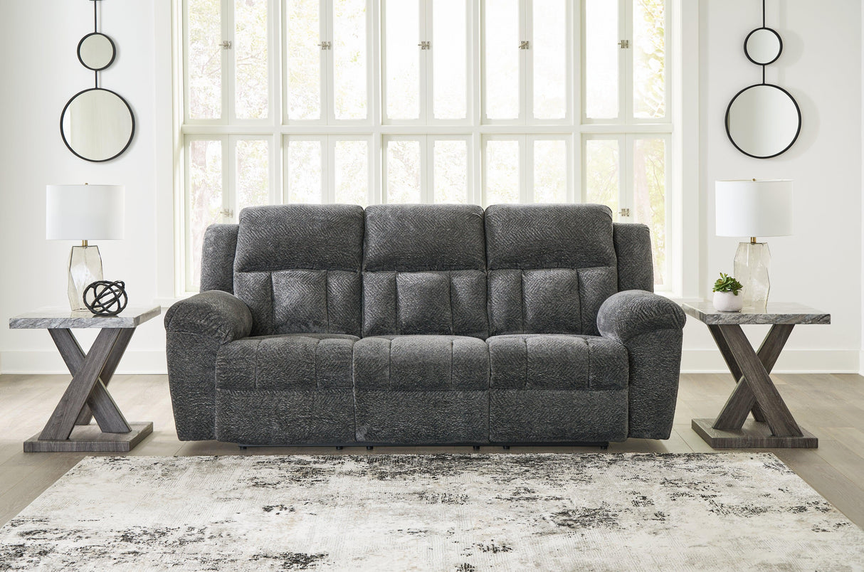 Frohn Graphite Manual Reclining Sofa by Ashley at Eve Furniture