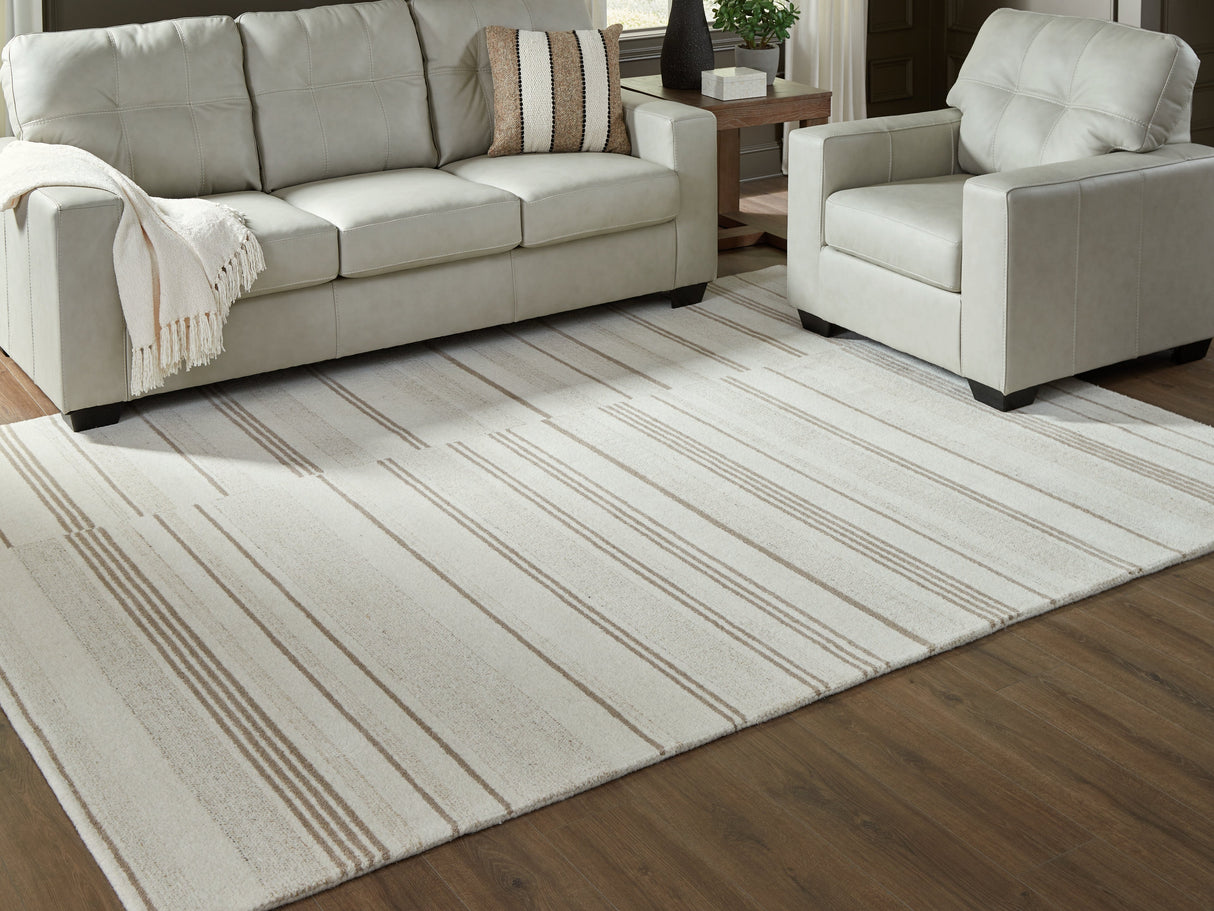 Gadence Ivory/Tan Large Rug by Ashley at Eve Furniture