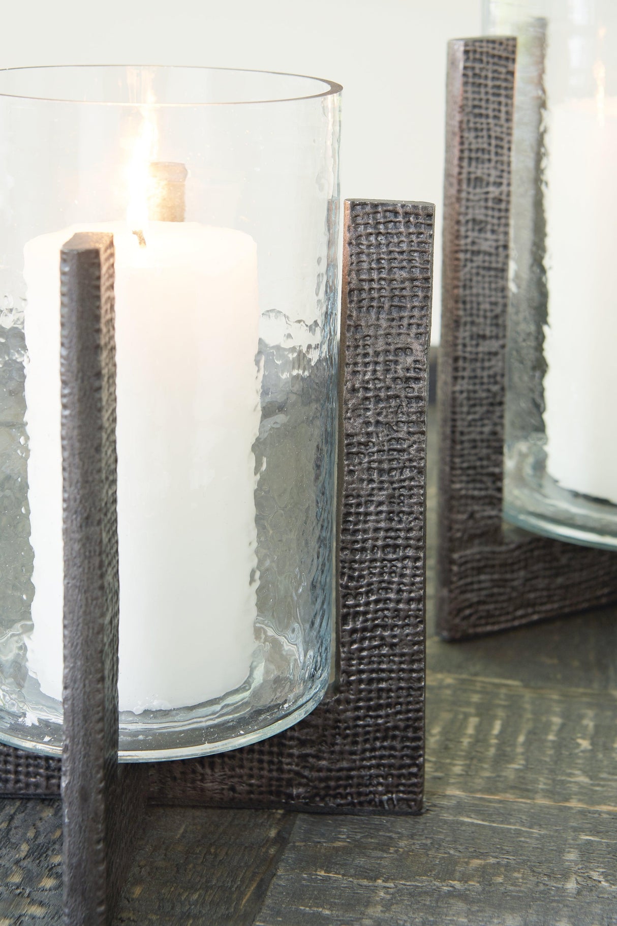 Garekton Clear/Pewter Finish Candle Holder by Ashley at Eve Furniture