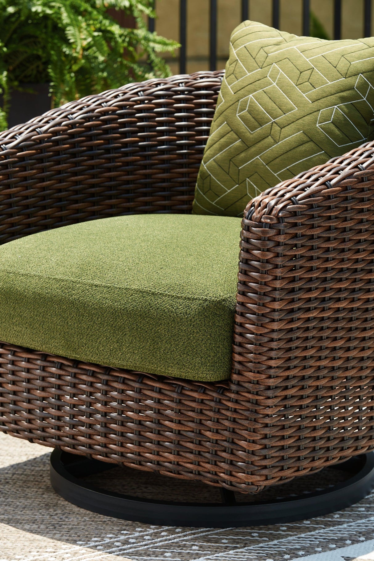 Horizon Hall Brown/Green Outdoor Swivel Lounge Chair with Cushion by Ashley at Eve Furniture