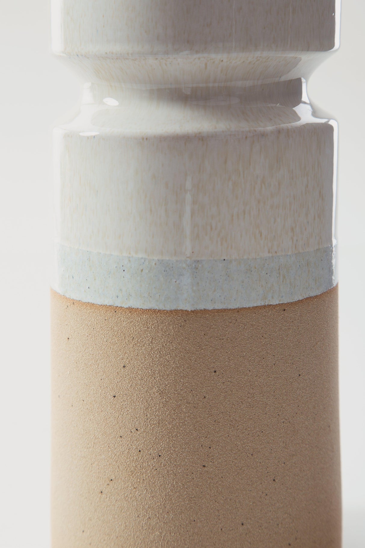 Hurston Ivory/Brown Candle Holder by Ashley at Eve Furniture