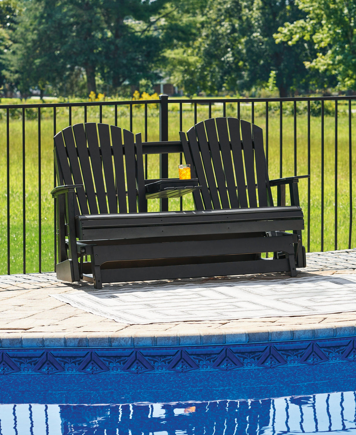 Hyland wave Black Outdoor Glider Loveseat by Ashley at Eve Furniture
