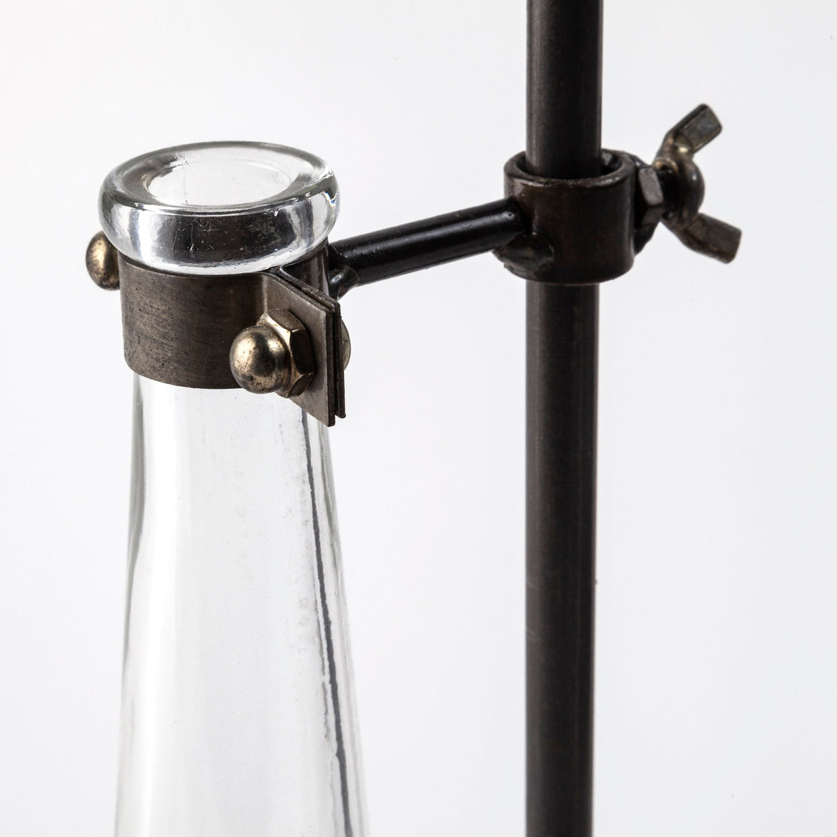 Jarvis Set of Five Dark Brown Metal and Glass Chemistry Inspired Bottles by Mercana at Eve Furniture