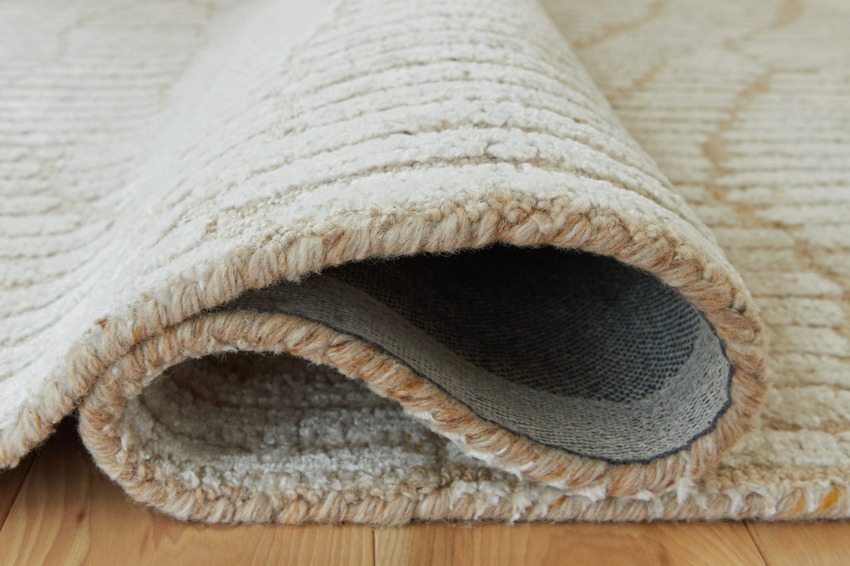 Jaseena Beige/Tan Large Rug by ASHLEY FURNITURE at Eve Furniture