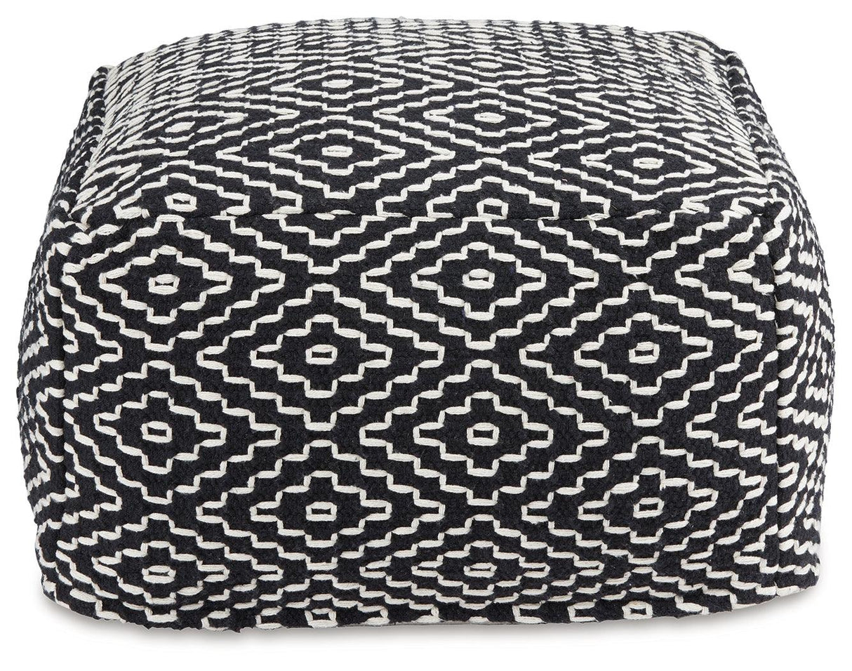 Jasett Black/Ivory Pouf by Ashley at Eve Furniture